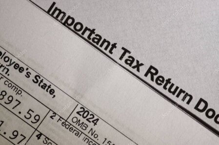 Employer reviewing a compliance checklist for hiring international employees